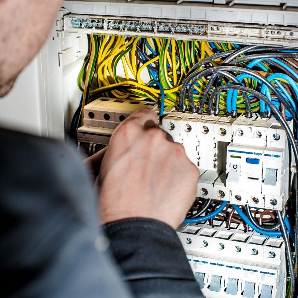 Electrican repairing wiring